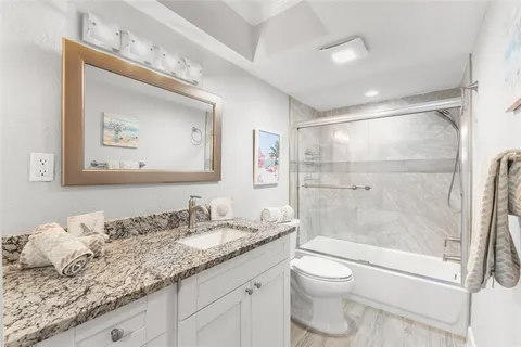 a view of a balcony with chairs