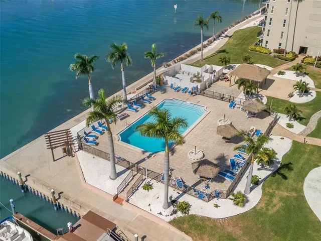 a front view of a house with garden and porch