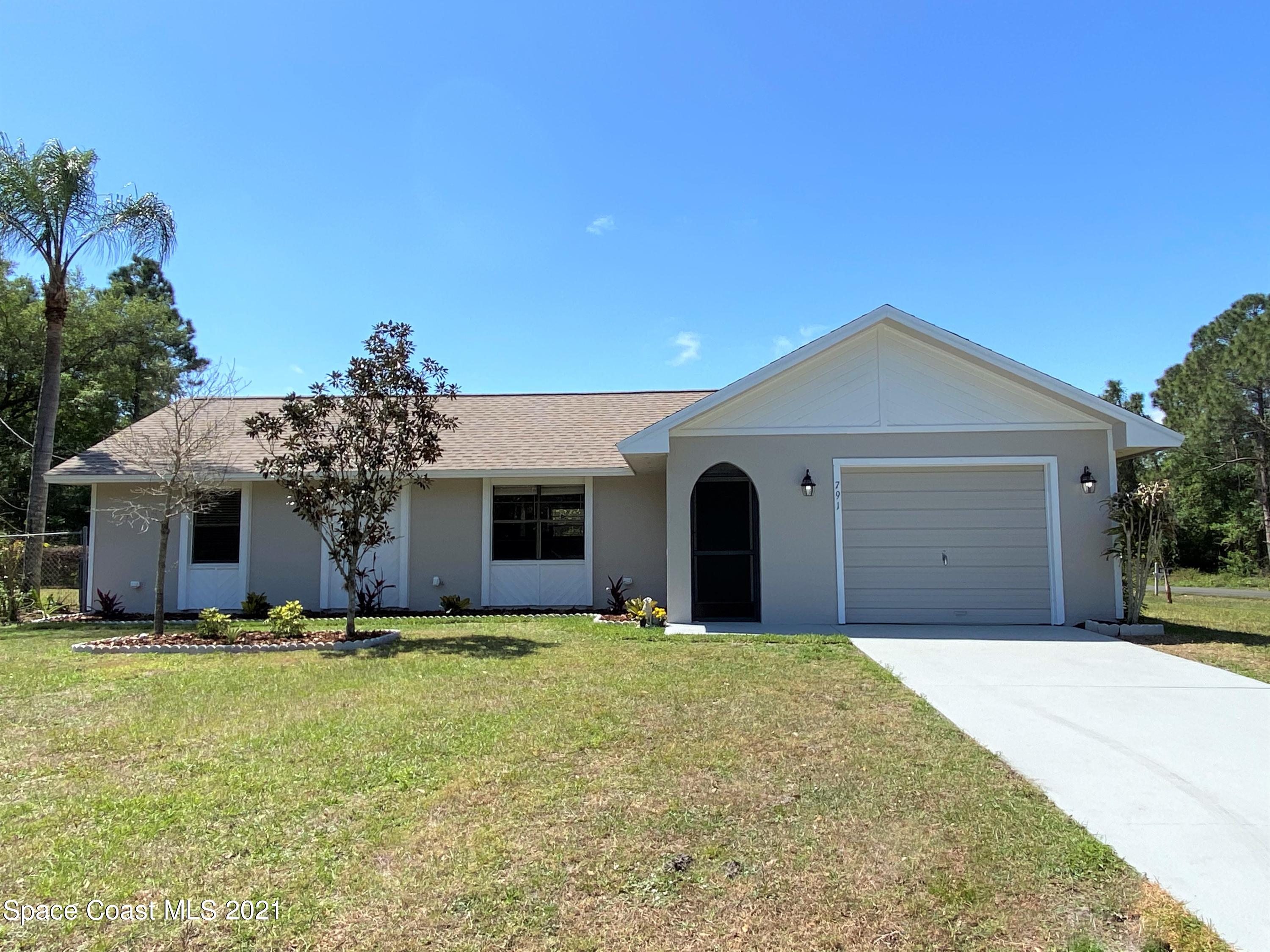 791 Atlantis Road Southeast Palm Bay, FL 32909 - Photo 1 of 23 Front Of Home