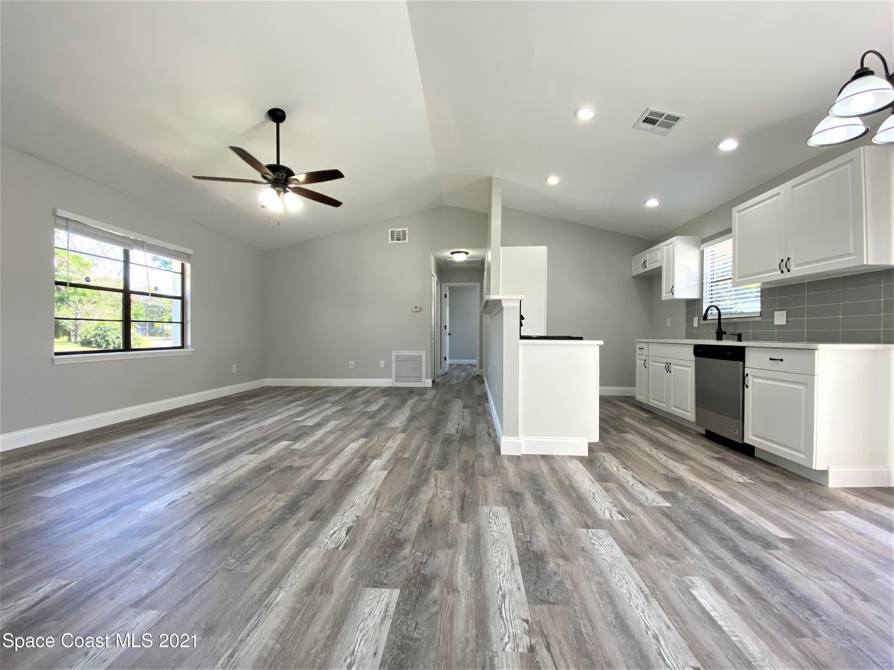 791 Atlantis Road Southeast Palm Bay, FL 32909 - Photo 3 of 23 3 Living 2