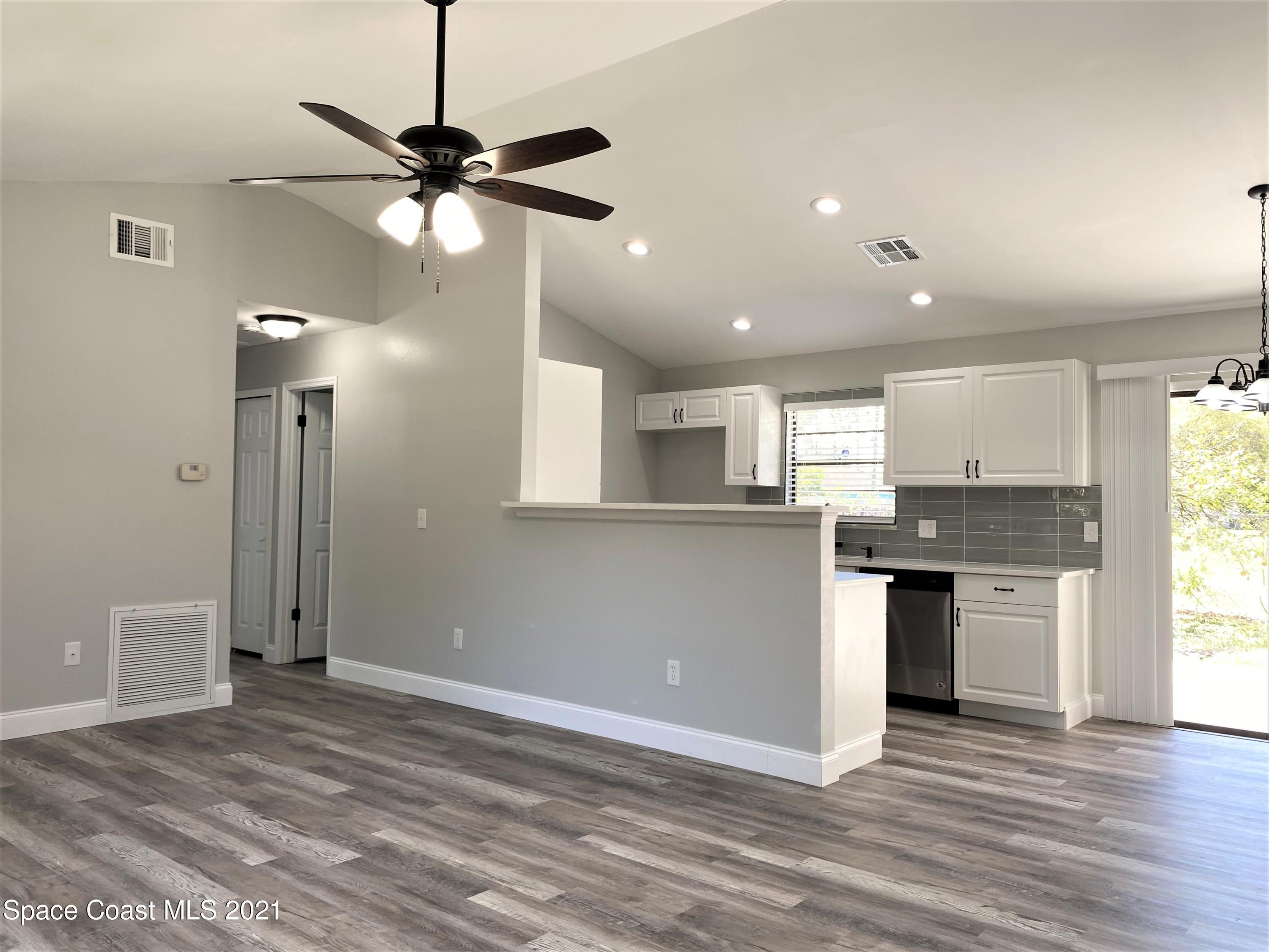 791 Atlantis Road Southeast Palm Bay, FL 32909 - Photo 4 of 23 4 Living 3