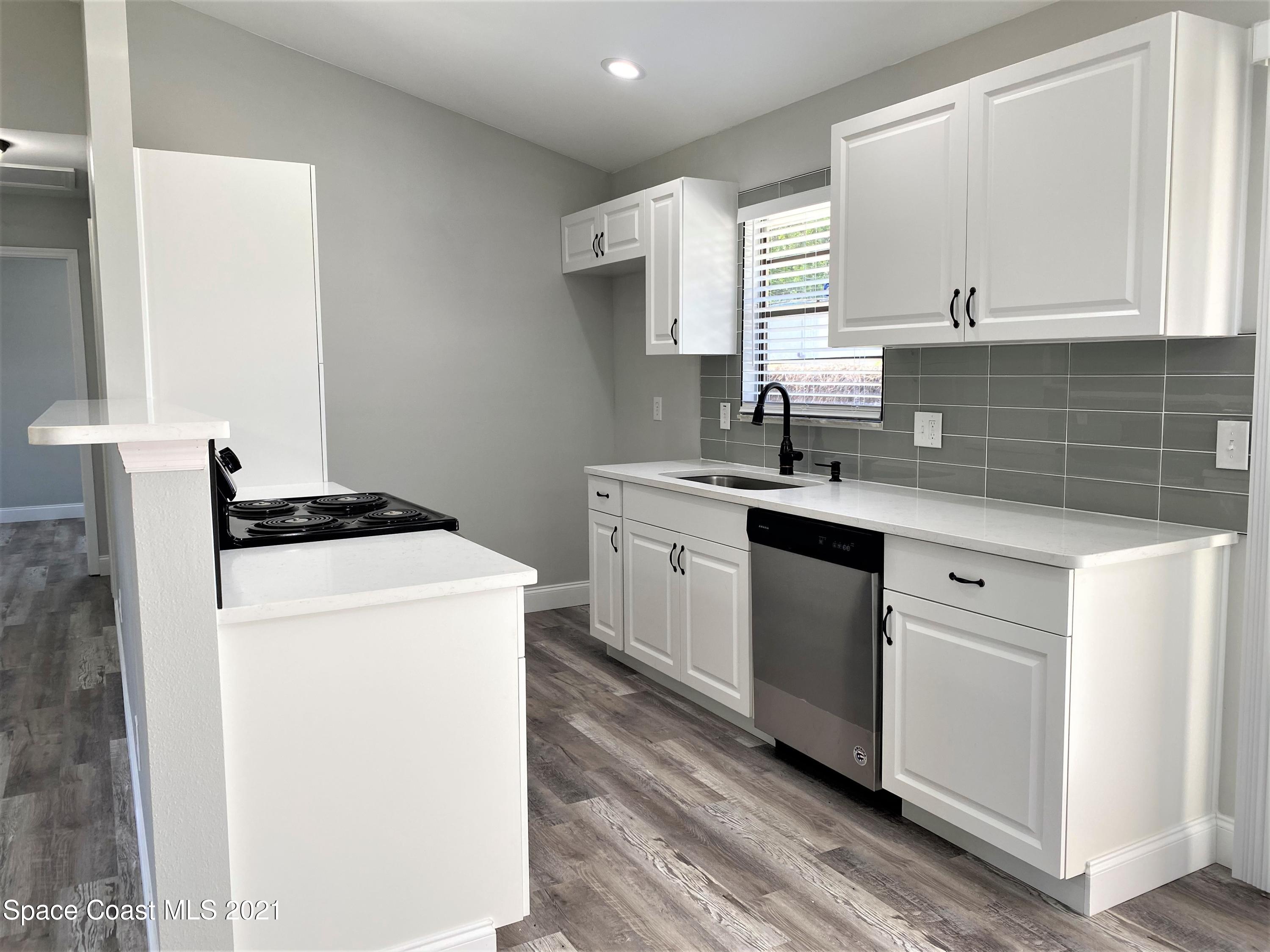791 Atlantis Road Southeast Palm Bay, FL 32909 - Photo 6 of 23 6 Kitchen 1