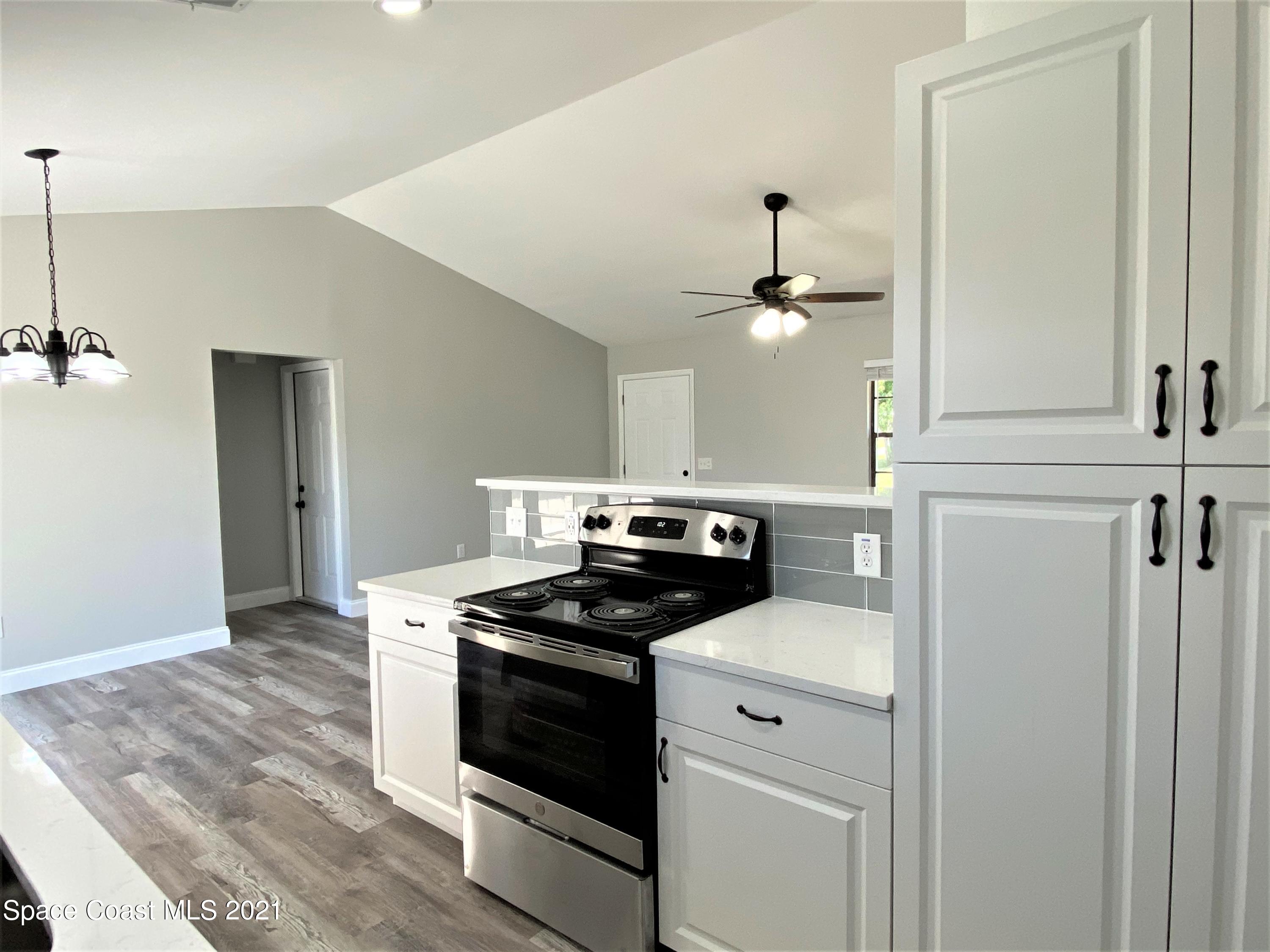 791 Atlantis Road Southeast Palm Bay, FL 32909 - Photo 9 of 23 9 Kitchen 4