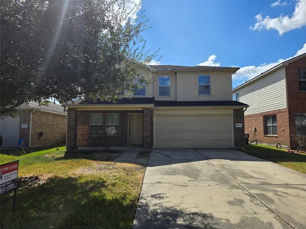 a front view of house with yard