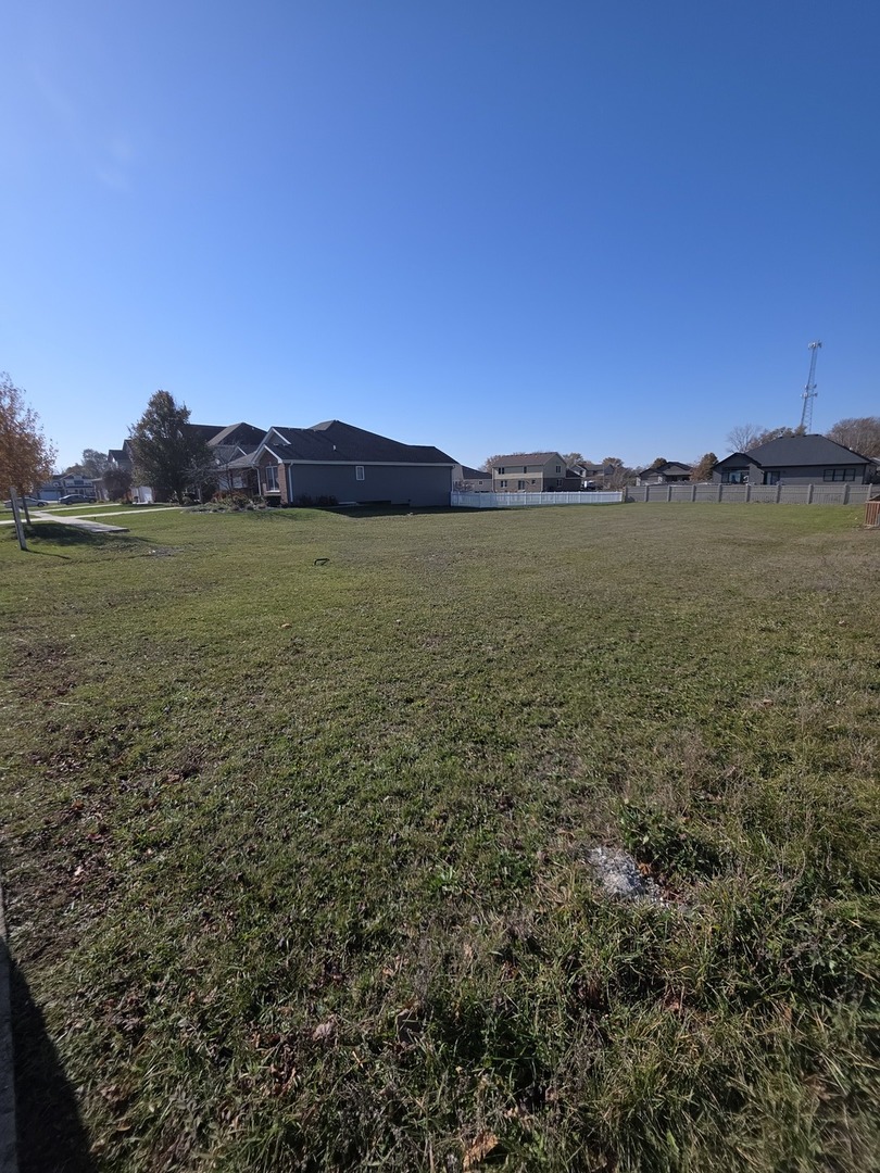 206 Hickory Street Peotone, IL 60468 - Photo 2 of 5 a view of an lake and a mountain