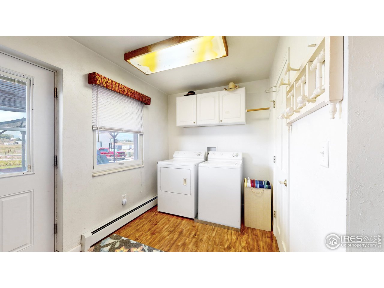 12775 East County Line Road Longmont, CO 80504 - Photo 21 of 40 a room with storage and utility