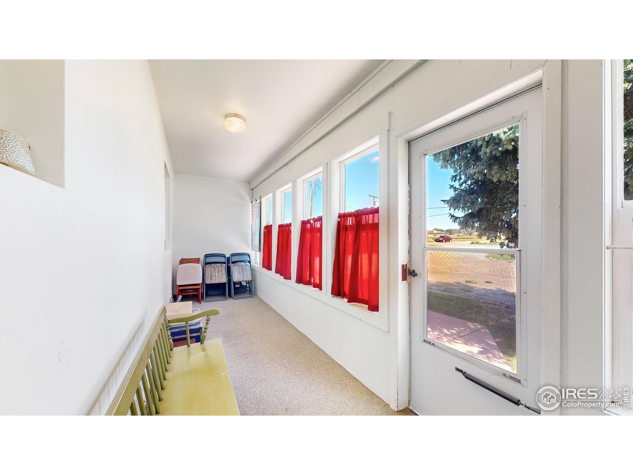 12775 East County Line Road Longmont, CO 80504 - Photo 22 of 40 a room with furniture and a rug