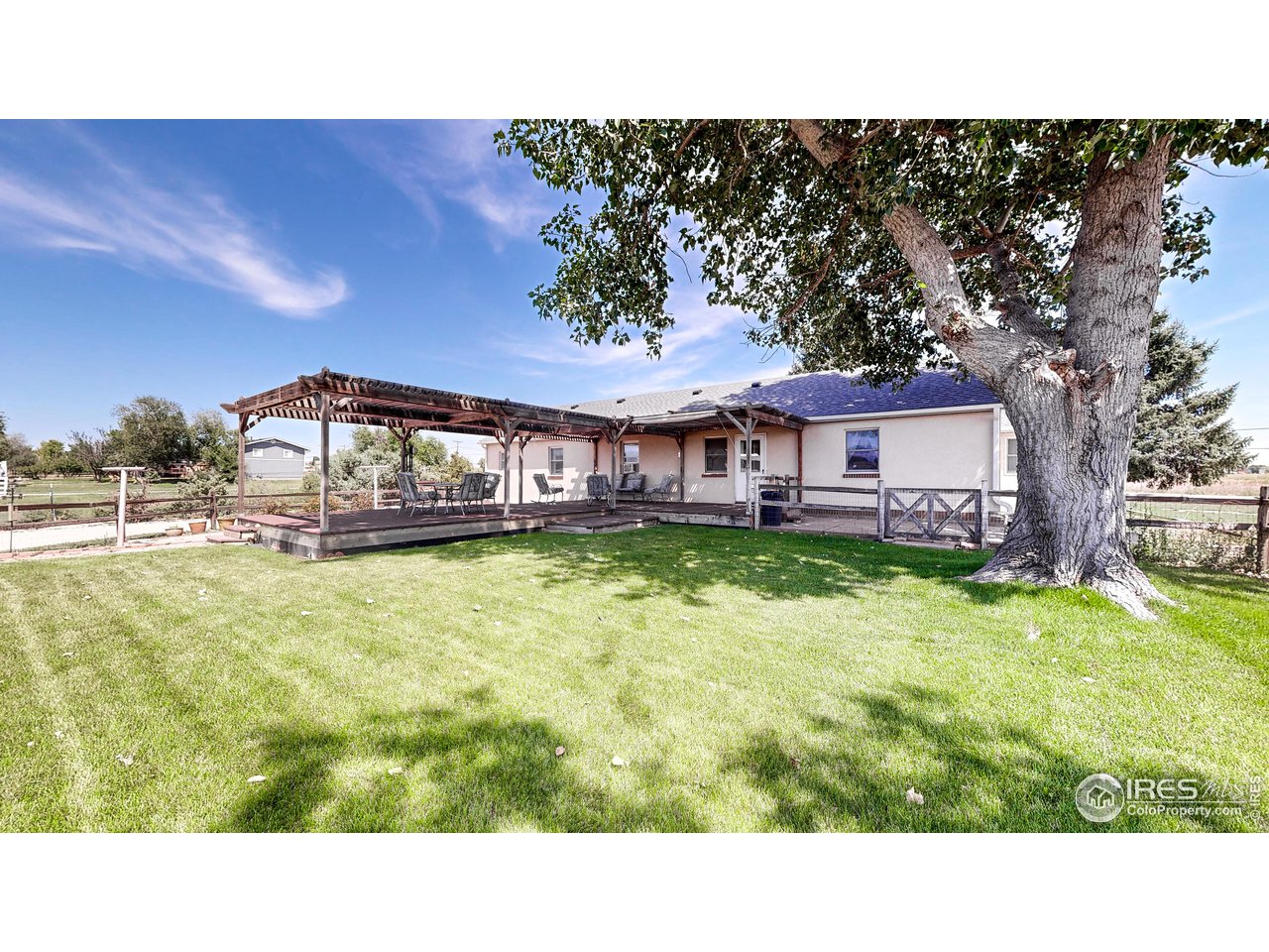 12775 East County Line Road Longmont, CO 80504 - Photo 25 of 40 a picture of a house with a backyard
