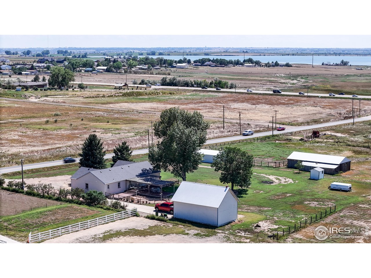 12775 East County Line Road Longmont, CO 80504 - Photo 35 of 40 an aerial view of a house with a garden and mountain view in back