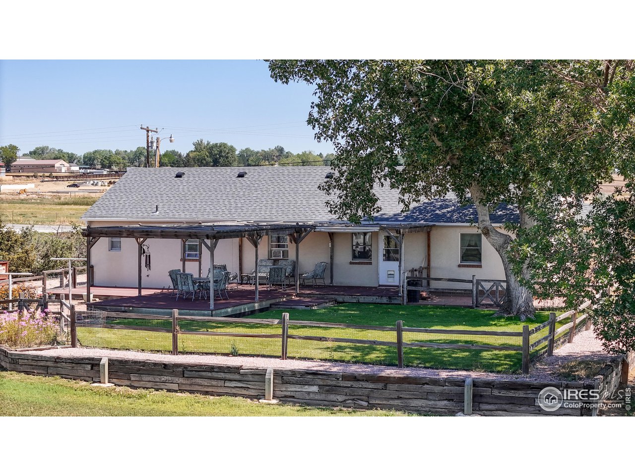 12775 East County Line Road Longmont, CO 80504 - Photo 36 of 40 a view of a house with a big yard