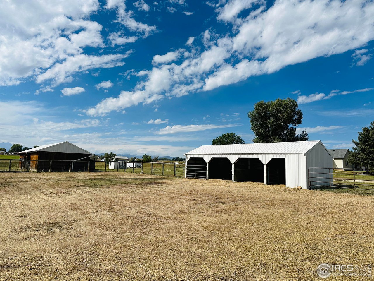 12775 East County Line Road Longmont, CO 80504 - Photo 39 of 40 a view of a house with a yard