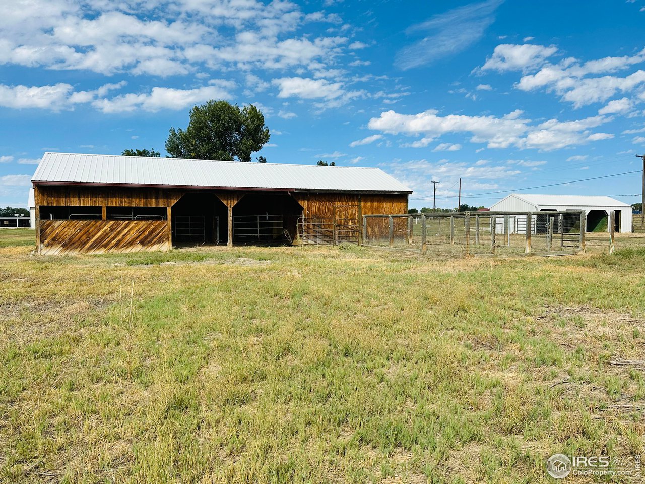 12775 East County Line Road Longmont, CO 80504 - Photo 40 of 40 a view of a swimming pool with an outdoor seating