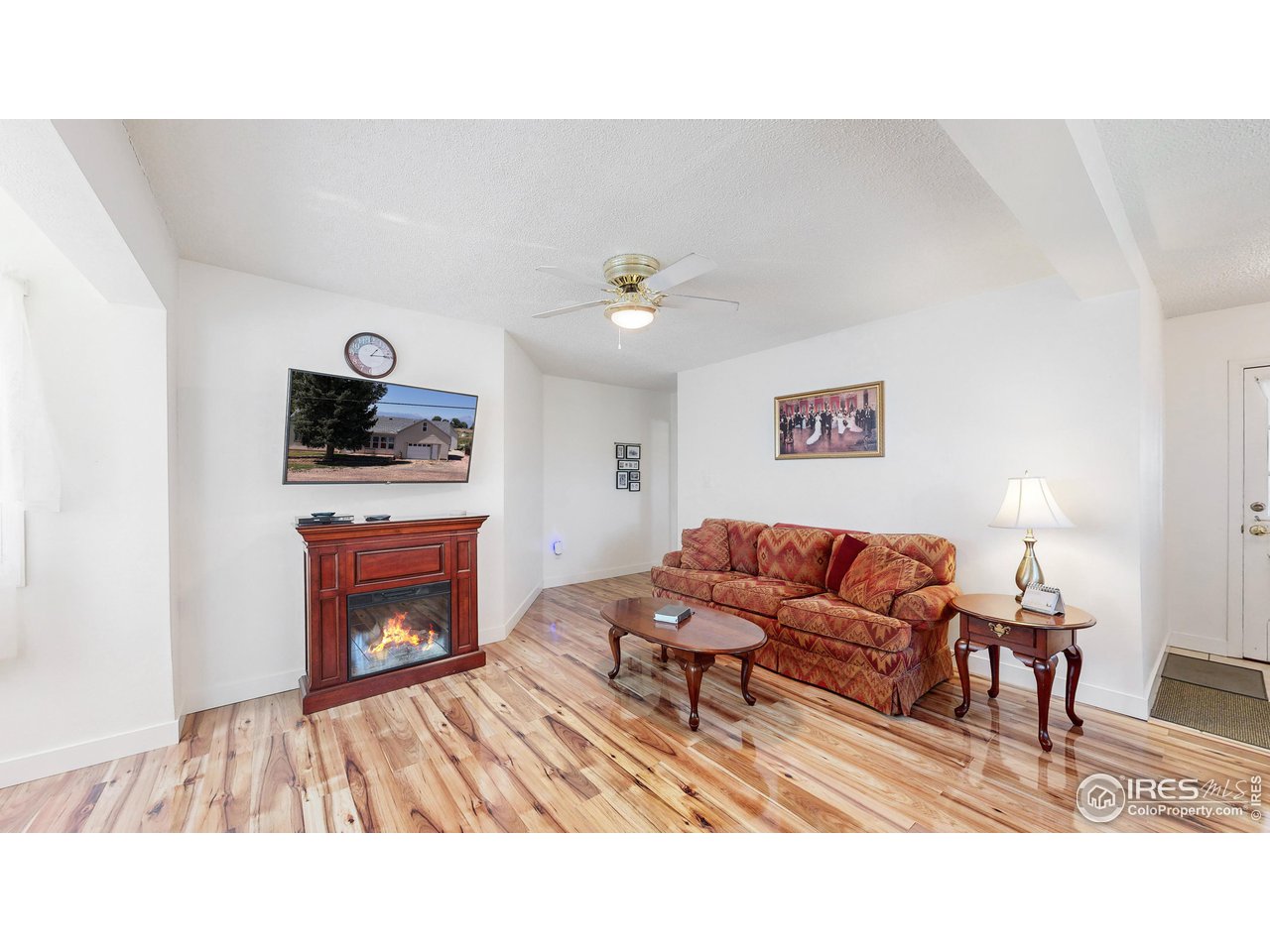 12775 East County Line Road Longmont, CO 80504 - Photo 5 of 40 a living room with furniture and a fireplace