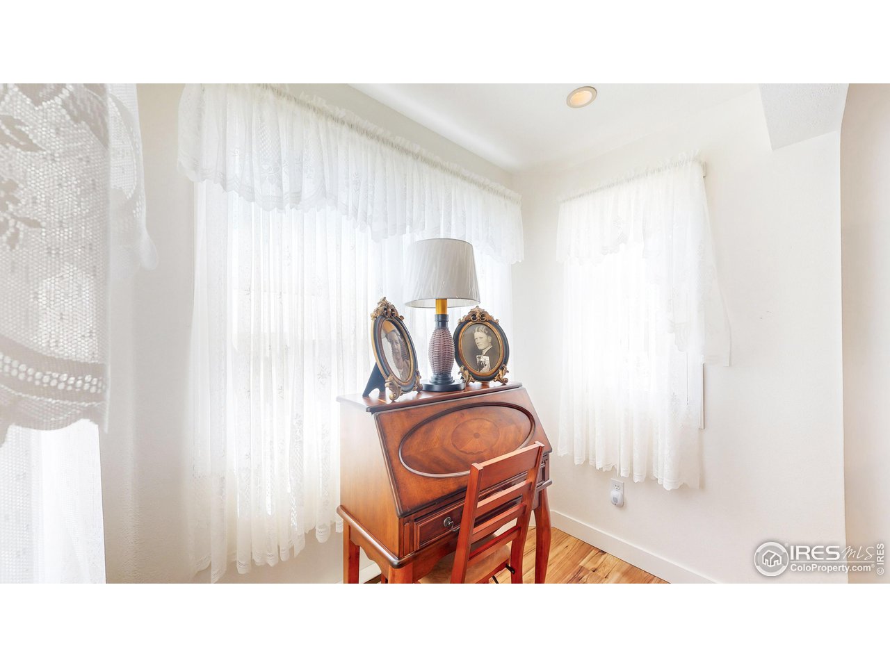12775 East County Line Road Longmont, CO 80504 - Photo 6 of 40 a bathroom with a sink and a mirror