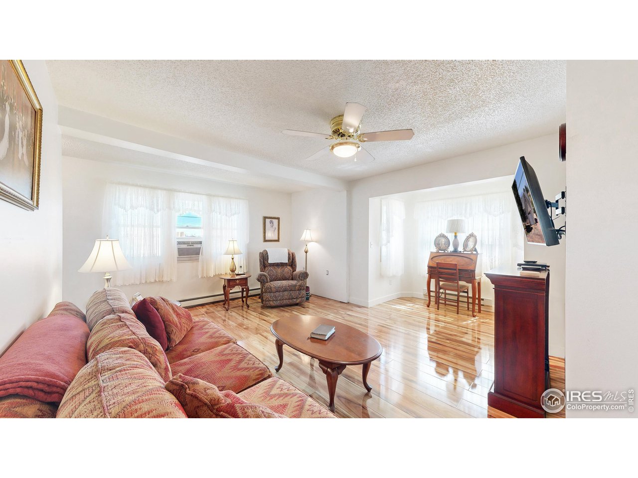 12775 East County Line Road Longmont, CO 80504 - Photo 7 of 40 a living room with furniture
