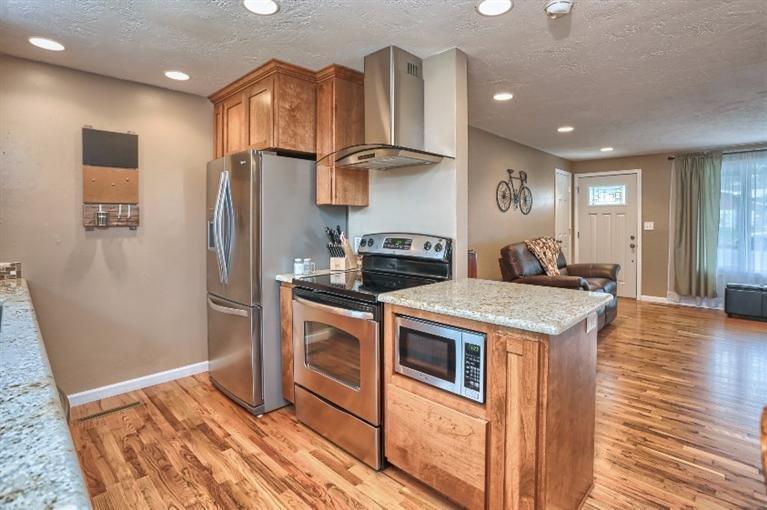 305 South Rose Street Phoenix, OR 97535 - Photo 7 of 35 Updated recessed lighting in kitchen and