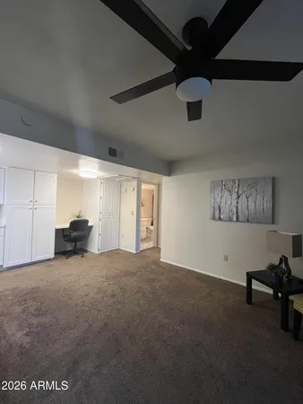 a view of an empty room and window