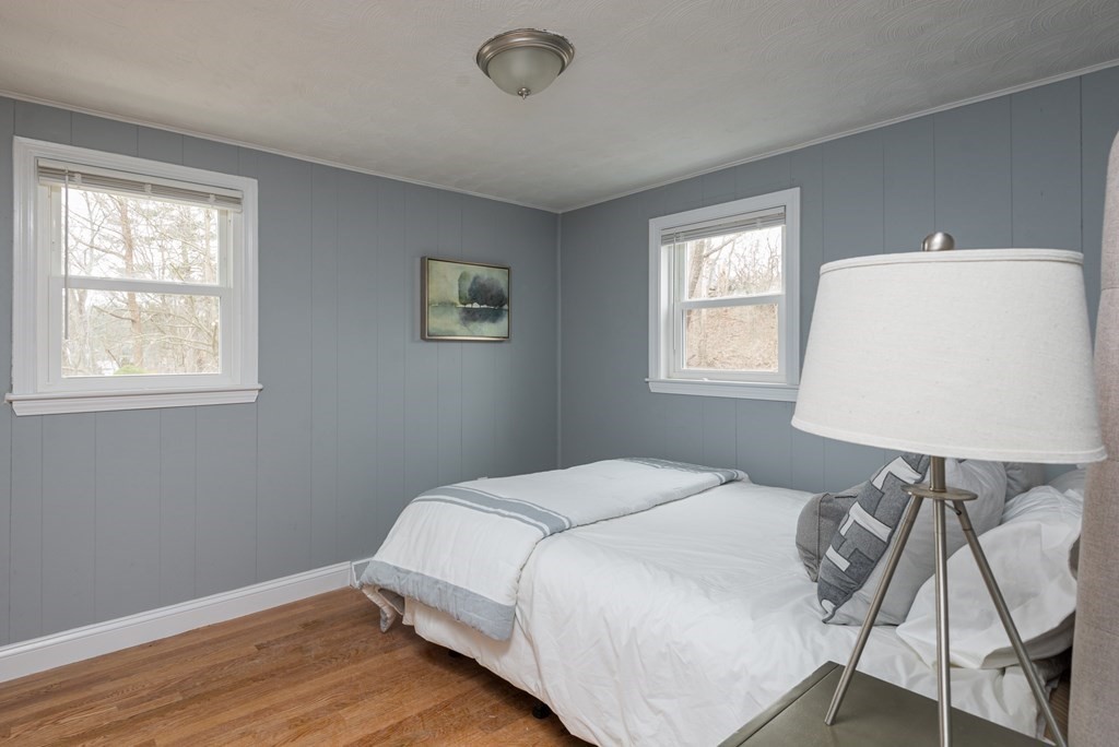 299 Center Street Randolph, MA 02368 - Photo 14 of 32 a bedroom with a bed and a window