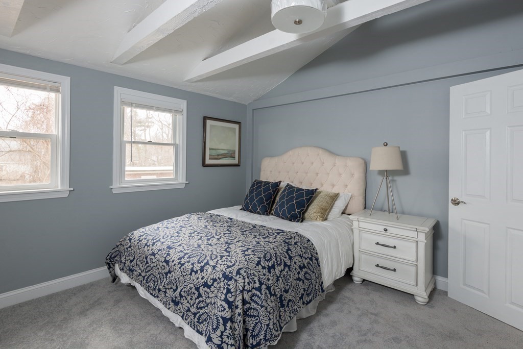 299 Center Street Randolph, MA 02368 - Photo 20 of 32 a bedroom with a bed and a window