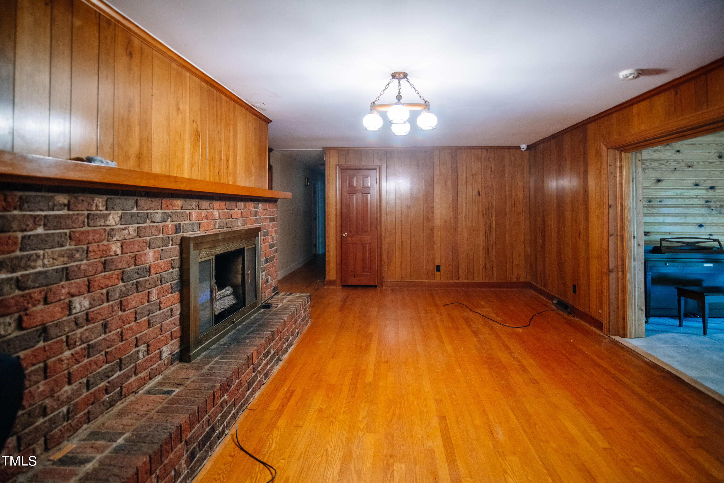 6700 Valley Lake Drive Raleigh, NC 27612 - Photo 11 of 23 a view of a livingroom with a fireplace