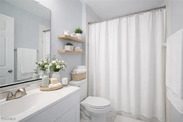 a view of a swimming pool with a patio and a yard