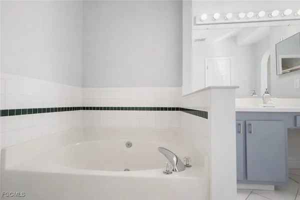 a white toilet sitting next to a window