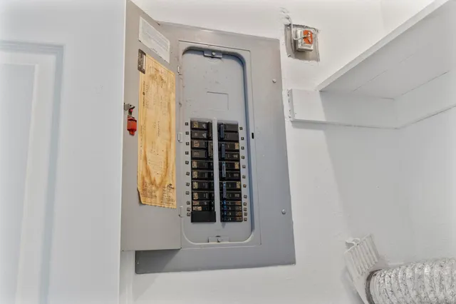 a bathroom with a tub and shower