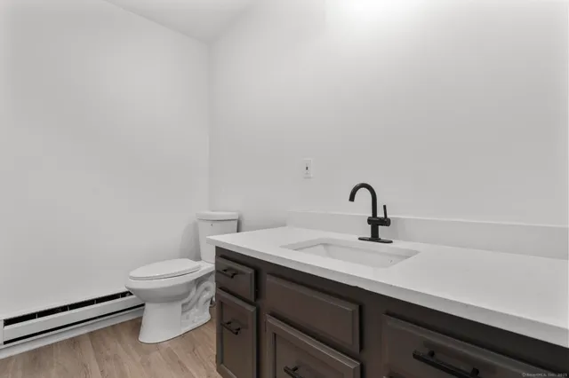 a bathroom with a sink and a toilet