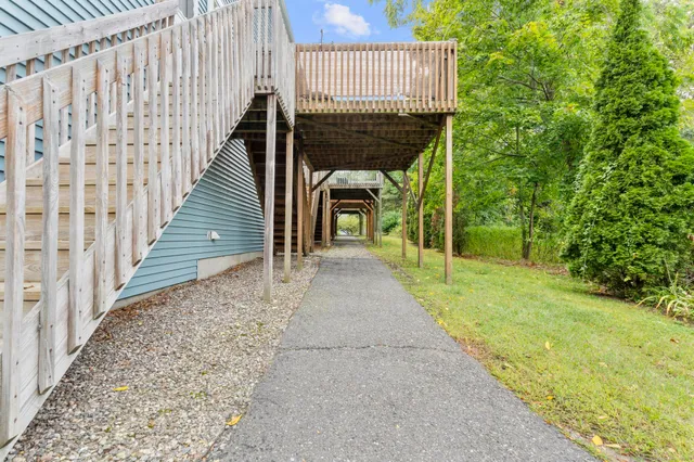 a view of a pathway with a patio