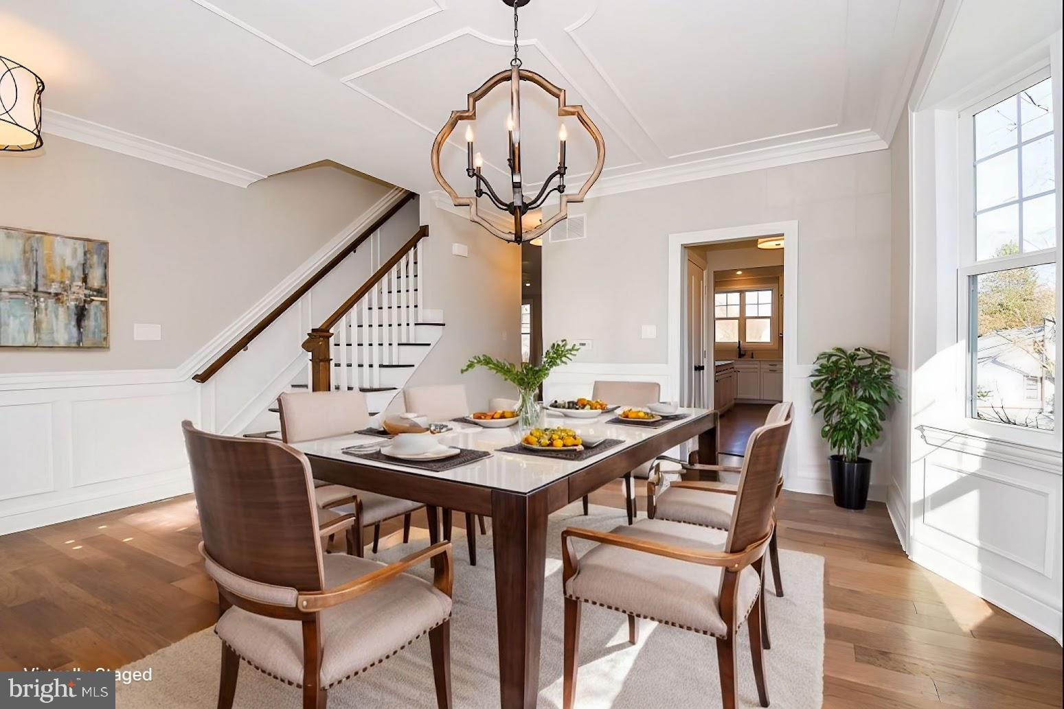 396 A Tavistock Boulevard Haddonfield, NJ 08033 - Photo 19 of 29 a dining room with furniture potted plants and wooden floor
