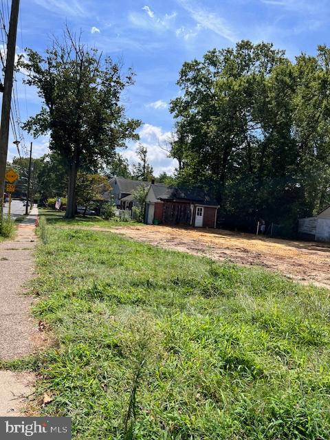 396 A Tavistock Boulevard Haddonfield, NJ 08033 - Photo 27 of 29 a swimming pool with outdoor seating and yard