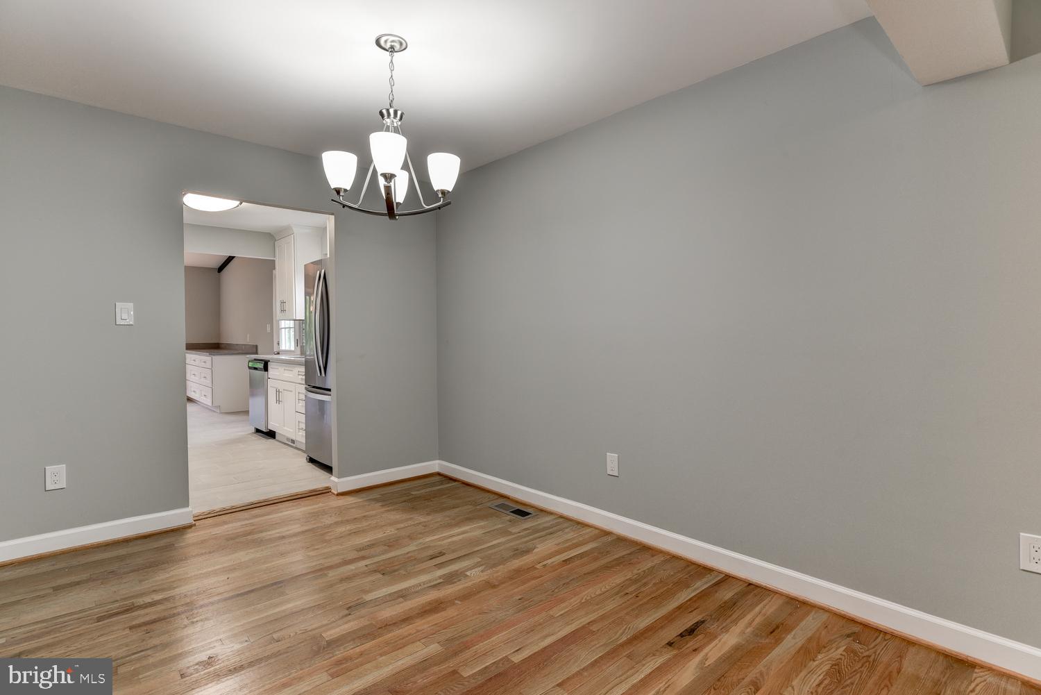 12702 North Point Lane Laurel, MD 20708 - Photo 13 of 42 Dining Room With HW Floor