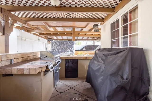 a view of a backyard with sitting area