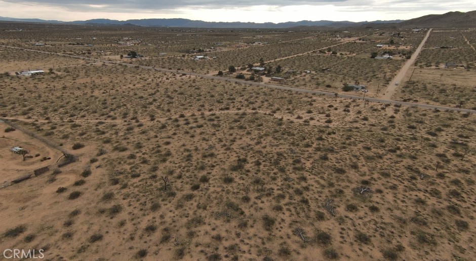 59520 Reche Road Landers, CA 92285 - Photo 5 of 11 a view of a large mountain with mountains in the background