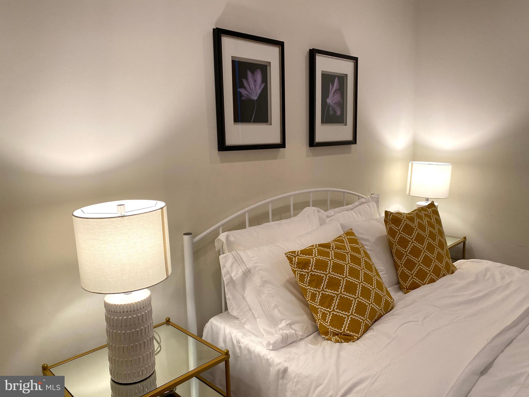 3304 Conrad Street Philadelphia, PA 19129 - Photo 24 of 29 a bed room with a bed and a chair