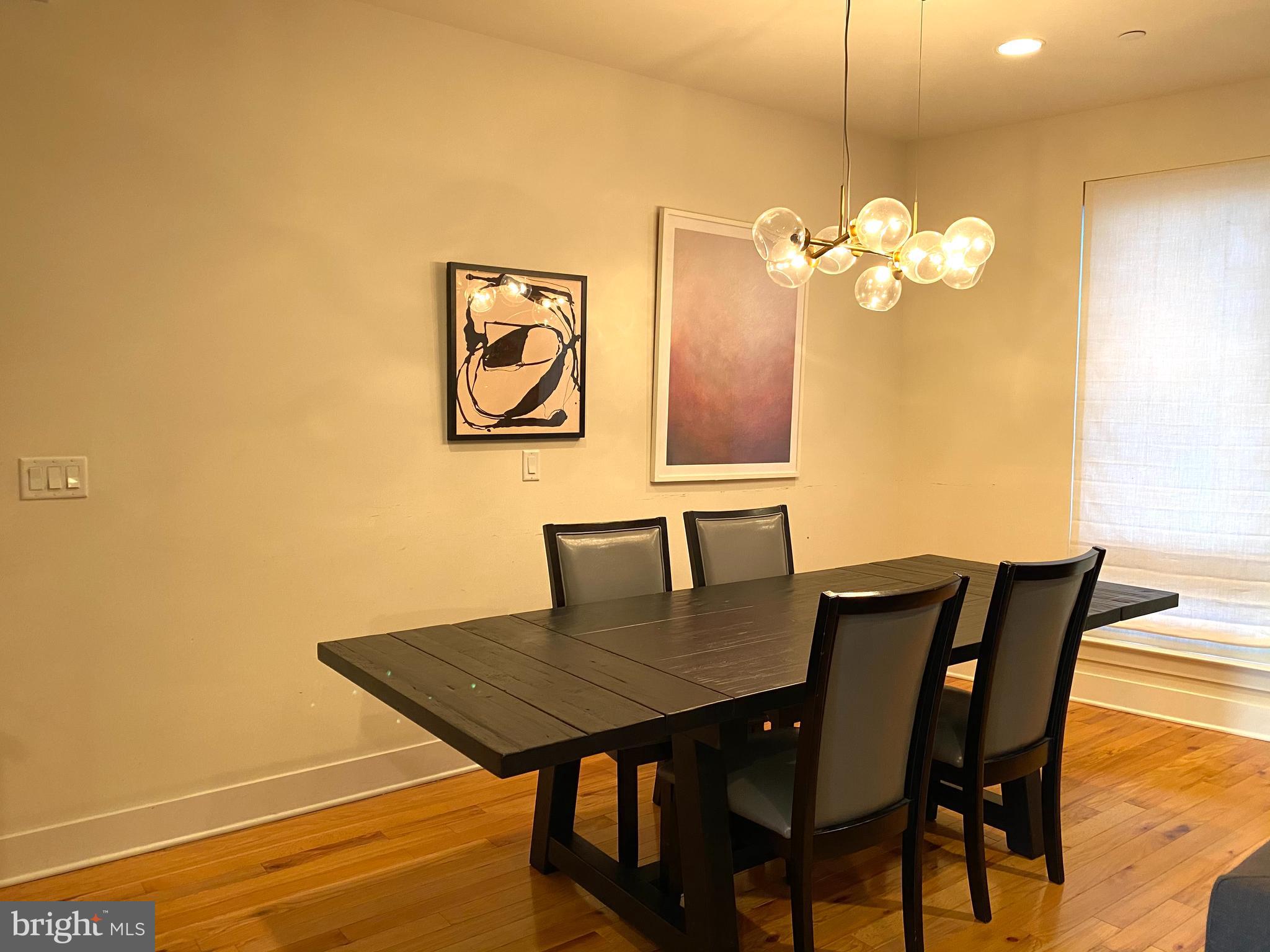 3304 Conrad Street Philadelphia, PA 19129 - Photo 9 of 29 a view of a dining room with furniture and wooden floor