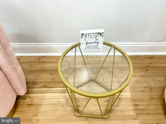 a view of wooden floor and dining room
