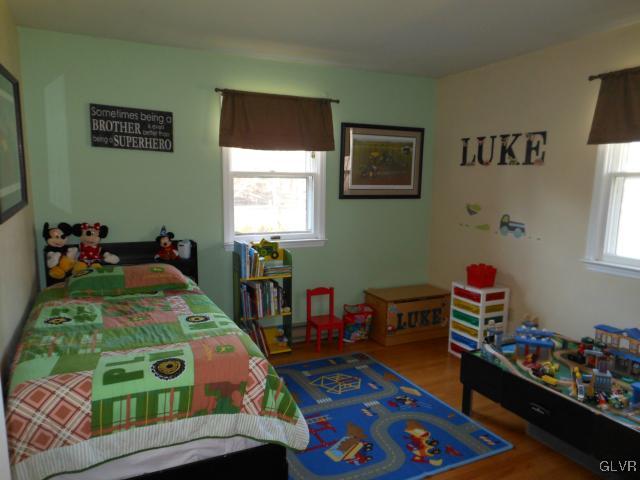 245 Maplewood Road Wind Gap, PA 18091 - Photo 3 of 15 a bedroom with bed and a window