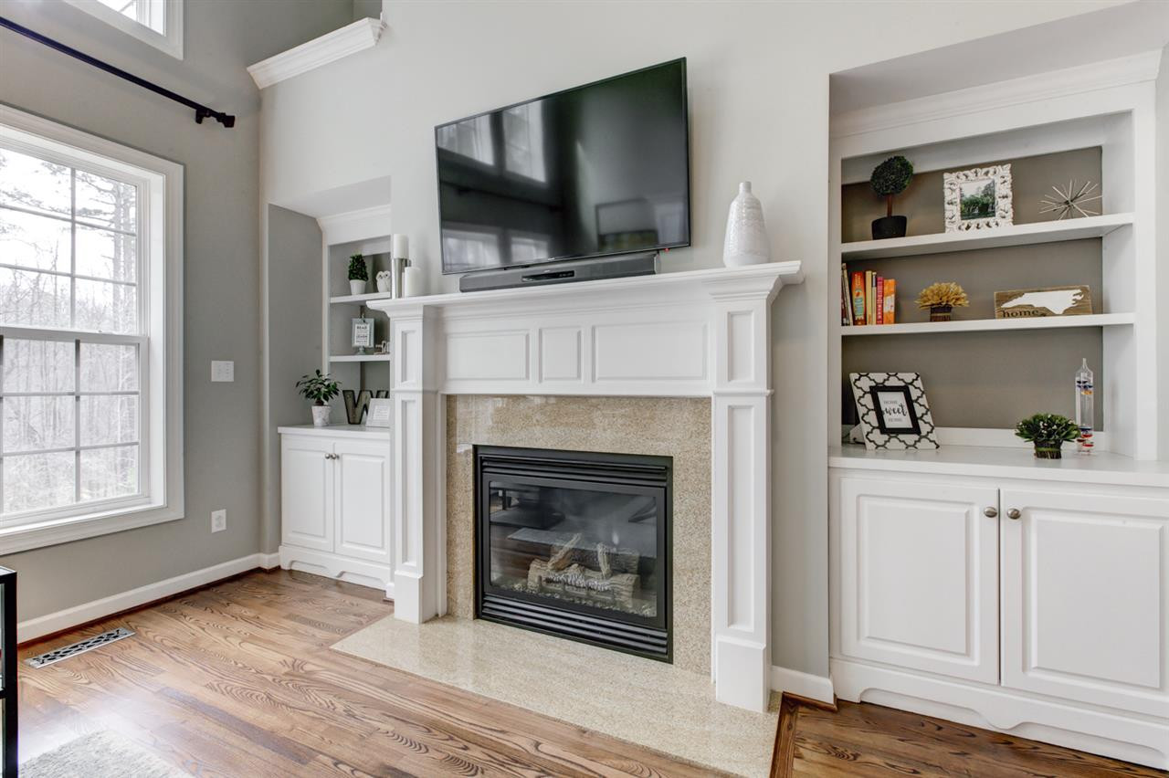 4015 Red Grape Drive Raleigh, NC 27607 - Photo 7 of 30 Fireplace with Side Bookcases