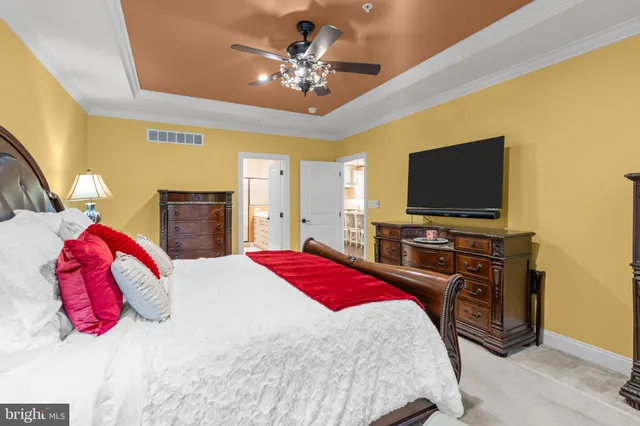 a bed room with bed and a window