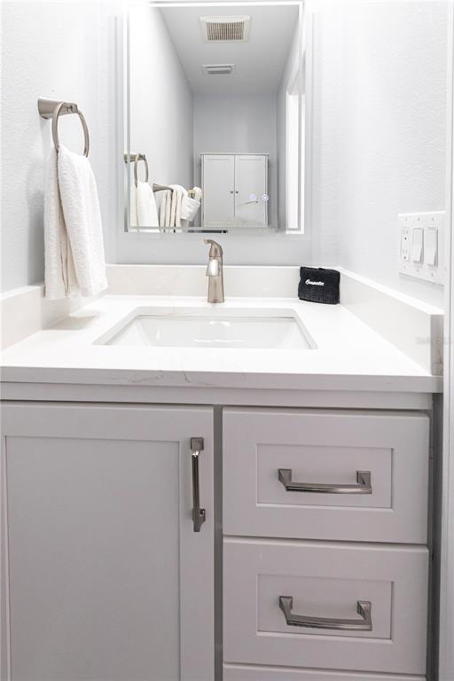 6020 Midnight Pass Road, Unit 30 Sarasota, FL 34242 - Photo 11 of 14 a close view of sink