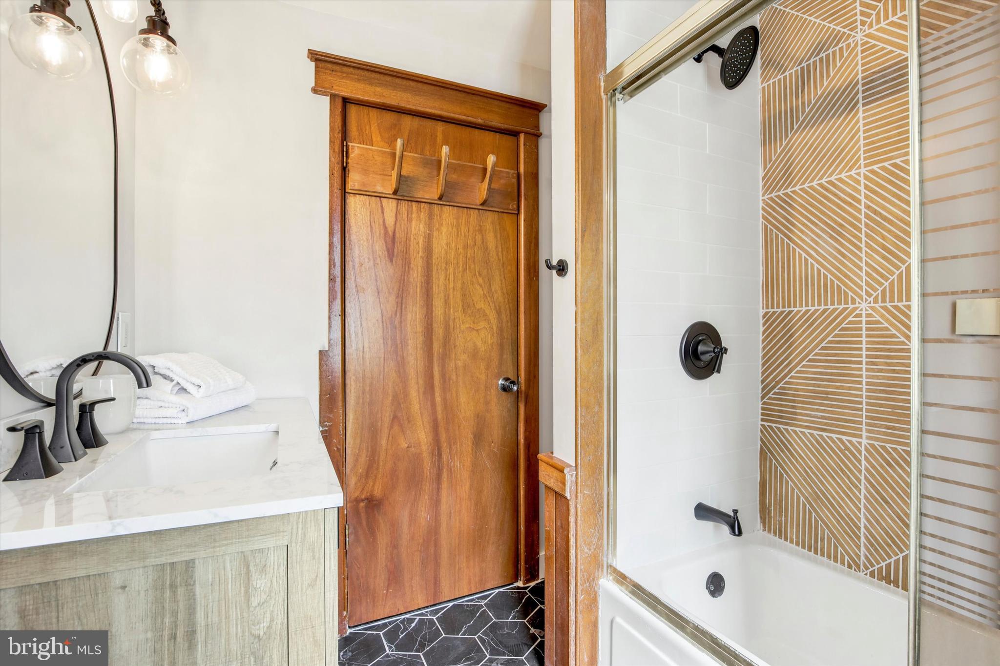 3131 Bedminster Road Ottsville, PA 18942 - Photo 19 of 23 a bathroom with a sink and a shower