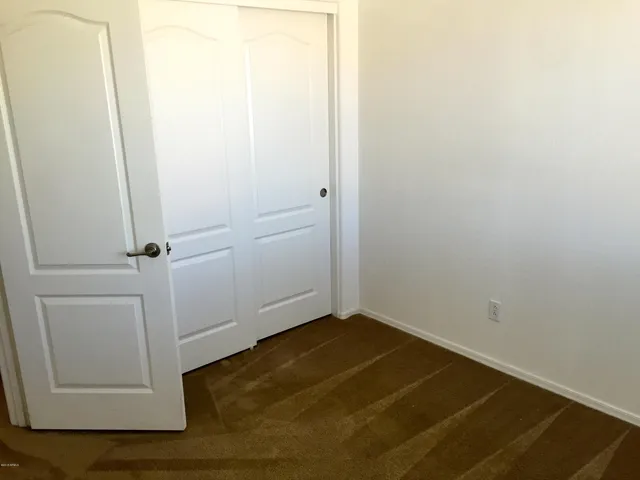 an empty room with a door