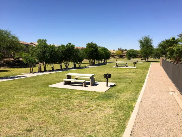 a view of a swimming pool with yard