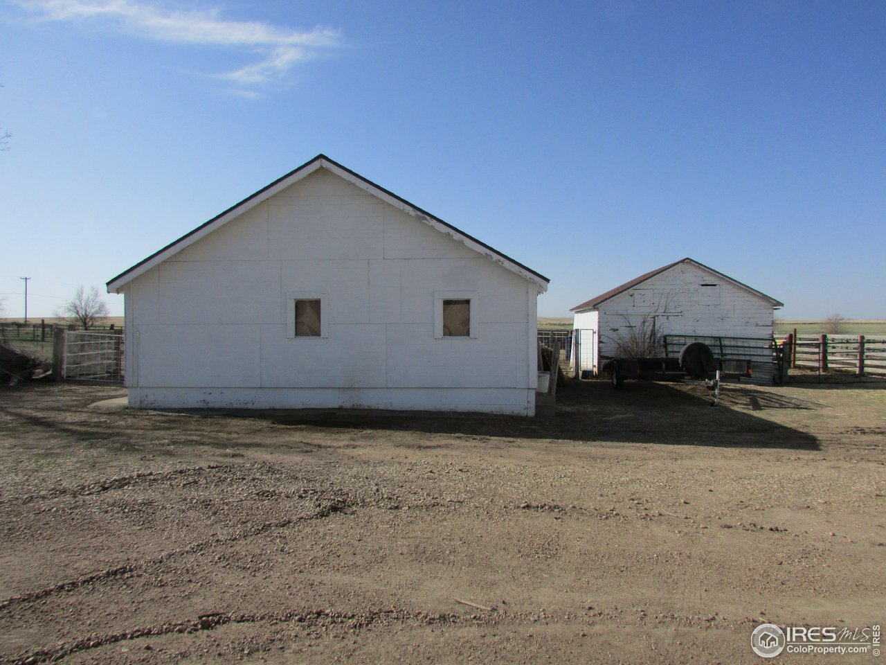 3669 County Road 45 Hudson, CO 80642 - Photo 21 of 25 a view of a house with backyard