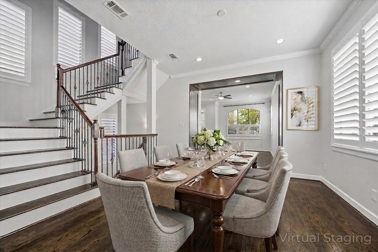 709 Herkimer Street Houston, TX 77007 - Photo 11 of 31 a view of a dining room with furniture window and wooden floor