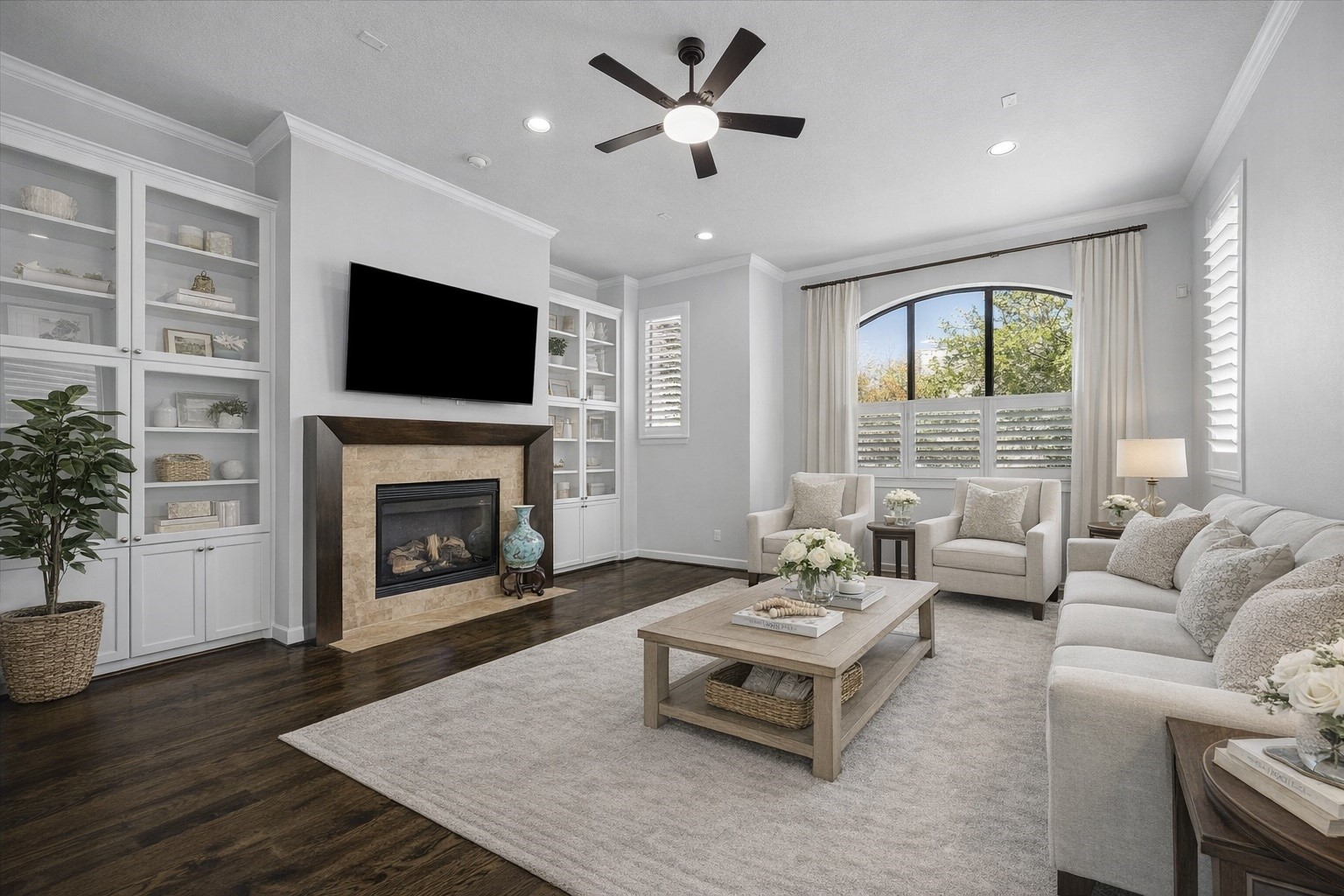 709 Herkimer Street Houston, TX 77007 - Photo 13 of 31 a living room with furniture a fireplace and a flat screen tv