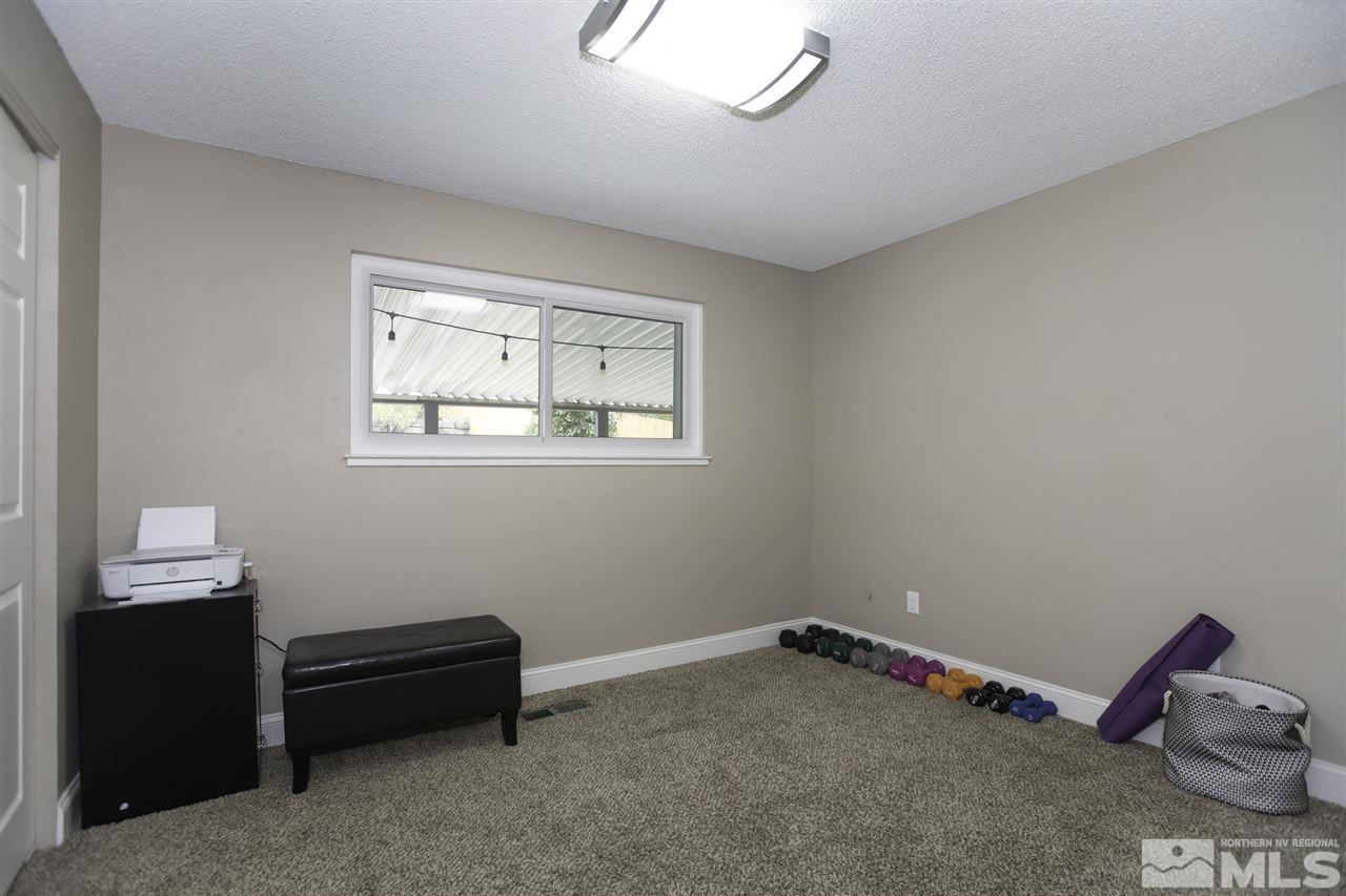 1055 Mark Allen Circle Reno, NV 89503 - Photo 15 of 27 a room with a window