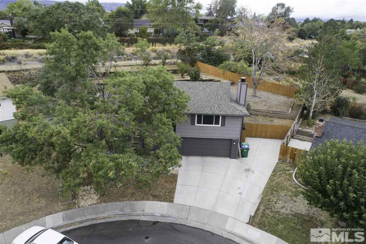 1055 Mark Allen Circle Reno, NV 89503 - Photo 2 of 27 an aerial view of a house with a yard