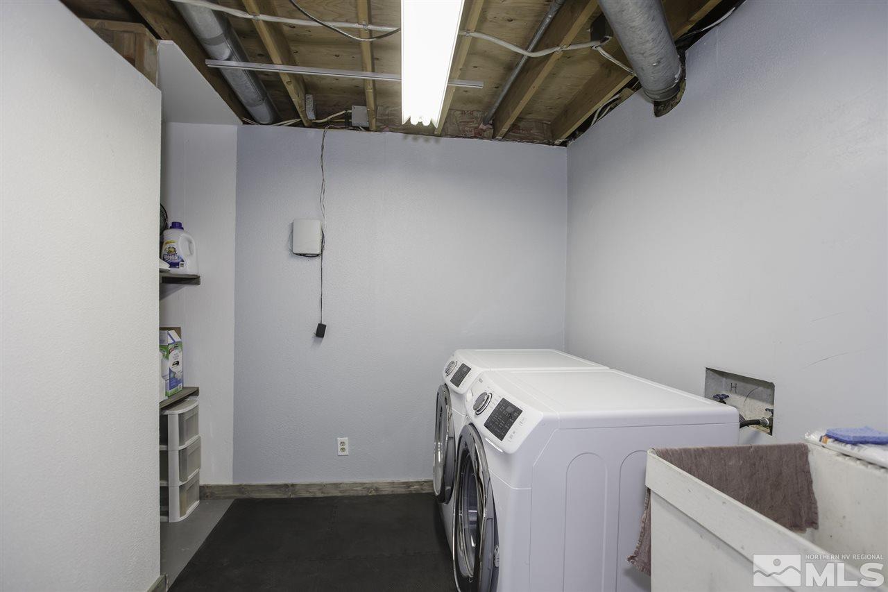 1055 Mark Allen Circle Reno, NV 89503 - Photo 21 of 27 a utility room with dryer and washer